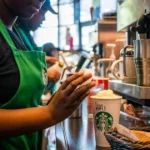 Starbucks Brings Back Green Apron Focus in New Uniform Policy