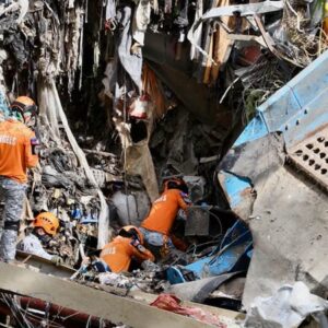 Rescuers Detect Signs of Life After Garbage Avalanche