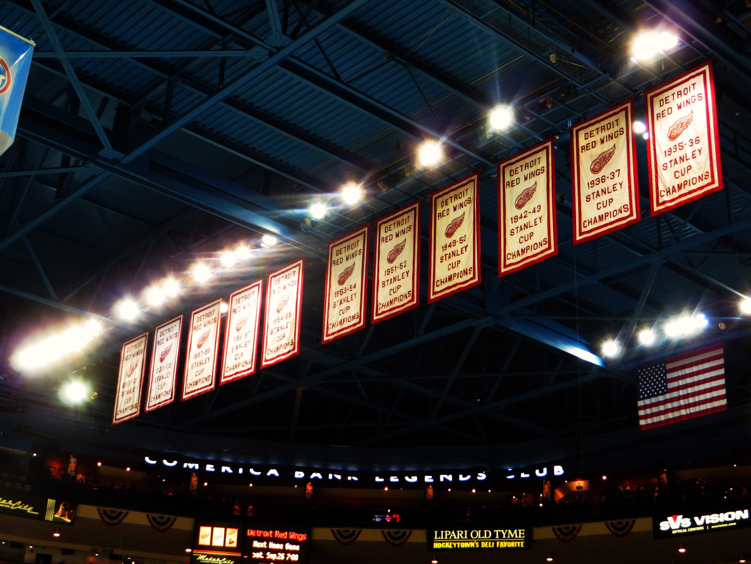 A gaming convention booth with banners showcasing a popular upcoming game