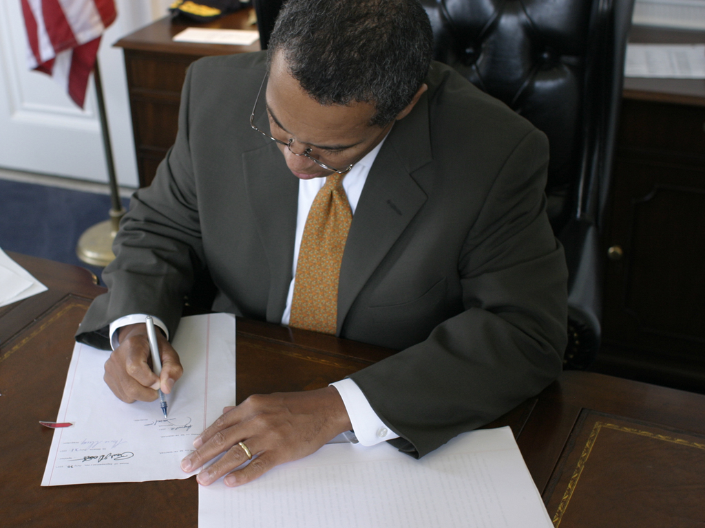 Symbolic representation of personal data, e.g., a computer showing ID cards and sensitive information floating in a digital cloud