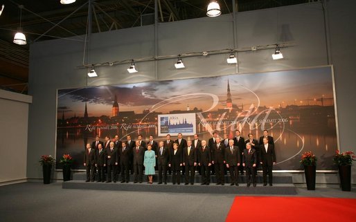 World leaders meeting at a NATO summit, symbolizing unity in support of Ukraine