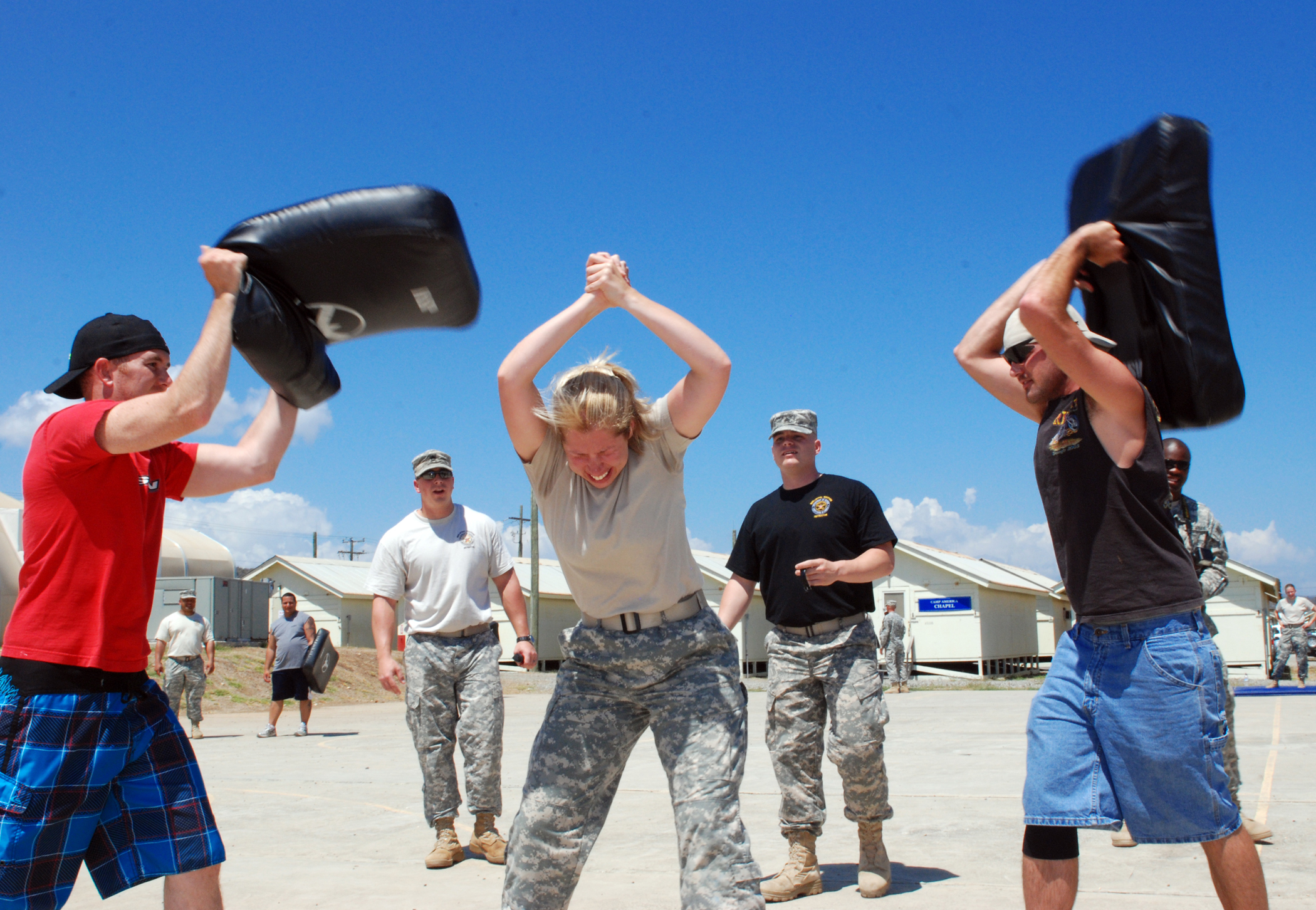 Cuban soldiers standing guard in uniform, symbolizing defensive readiness