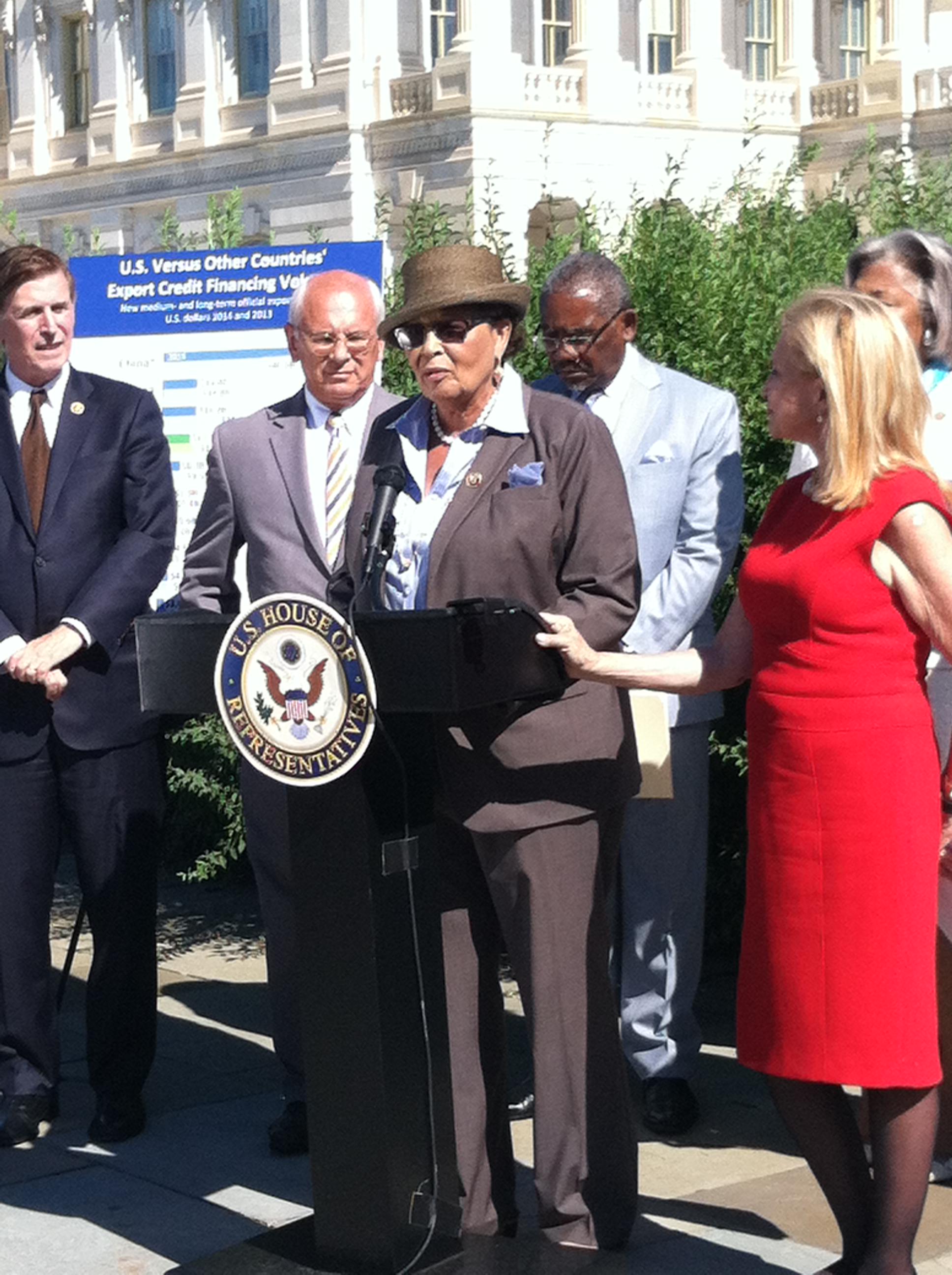 A government official speaking at a press conference