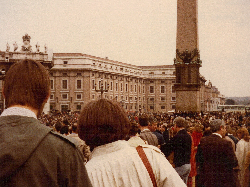 A wide shot of St. Peter's Square filled with attendees listening to Pope Leo XIV's address
