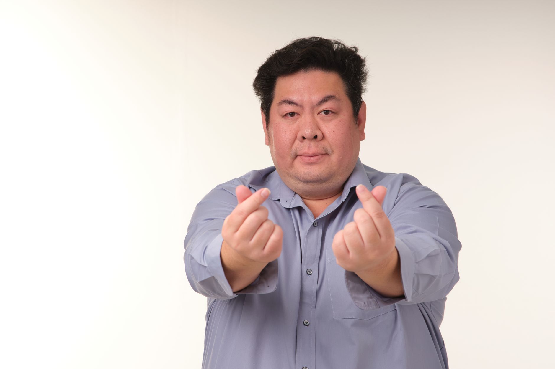 North Korea finger heart